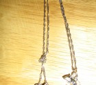 Silver rat on a chain